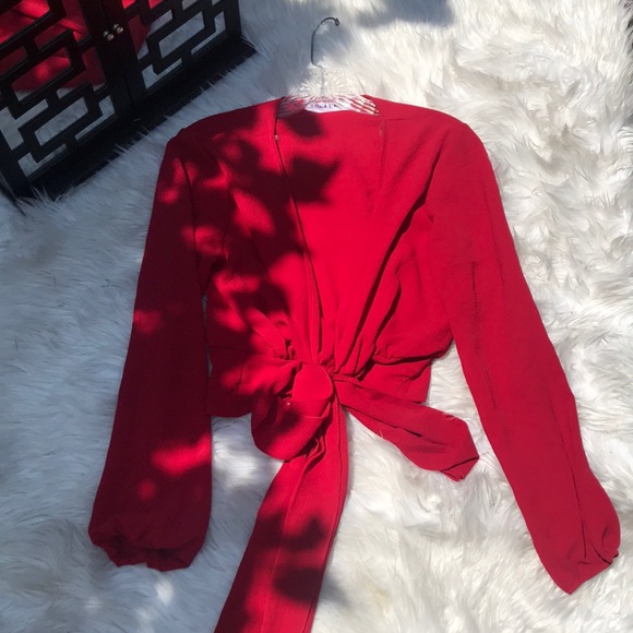 Red top with tie on the front. - Picture 1 of 6